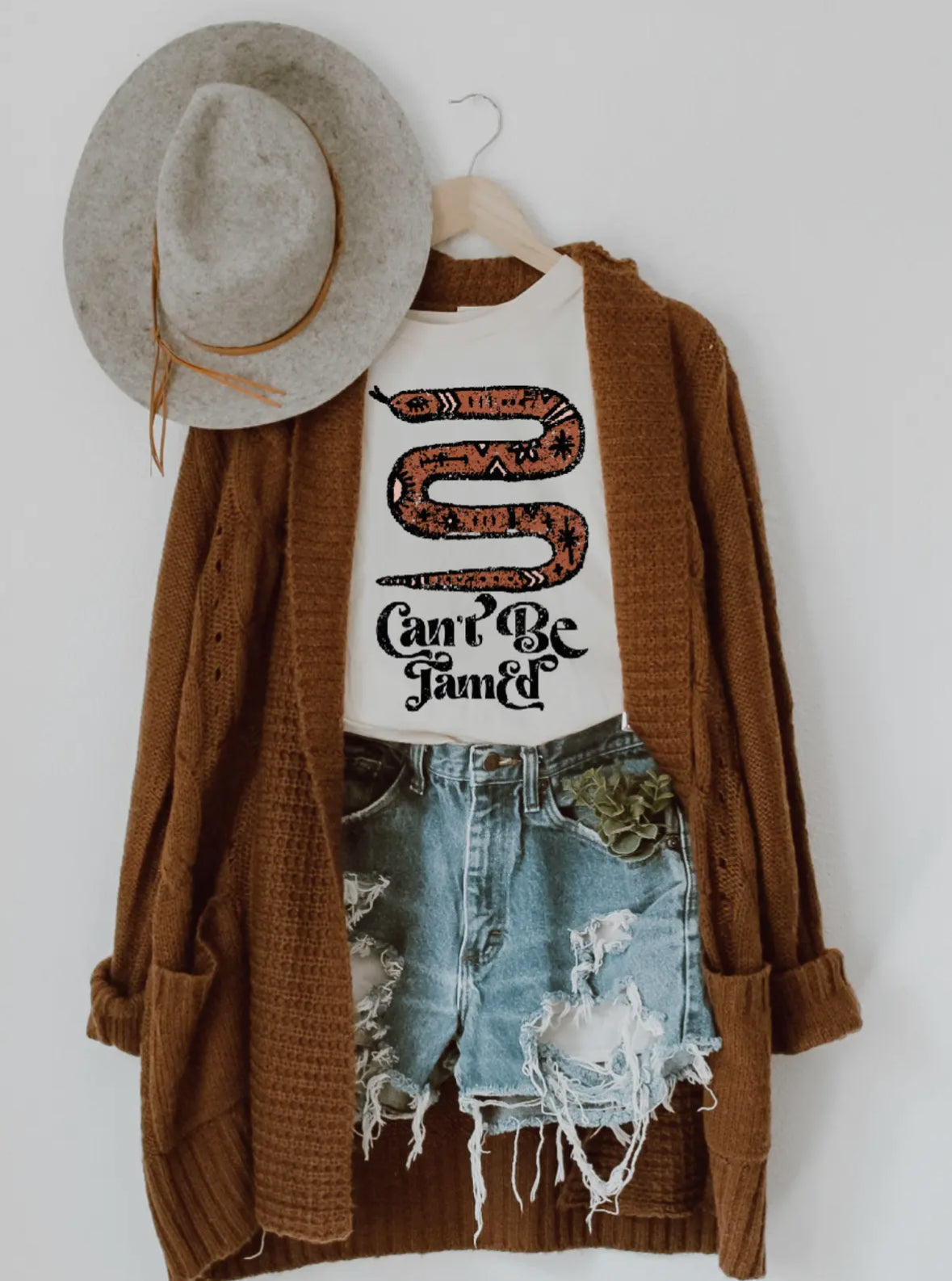 Can’t Be Tamed Tee