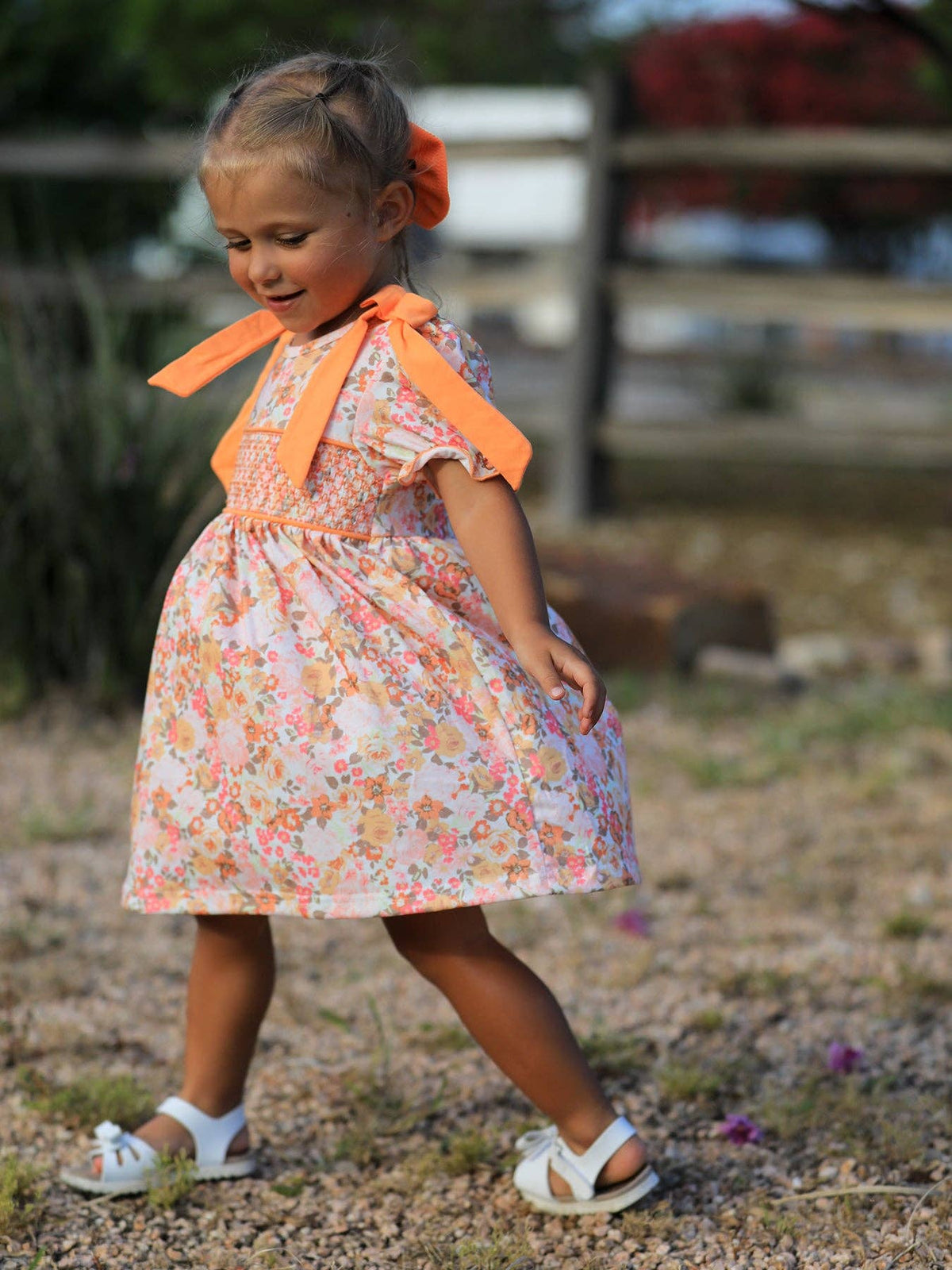 Peachy Bow Smocked Floral Dress