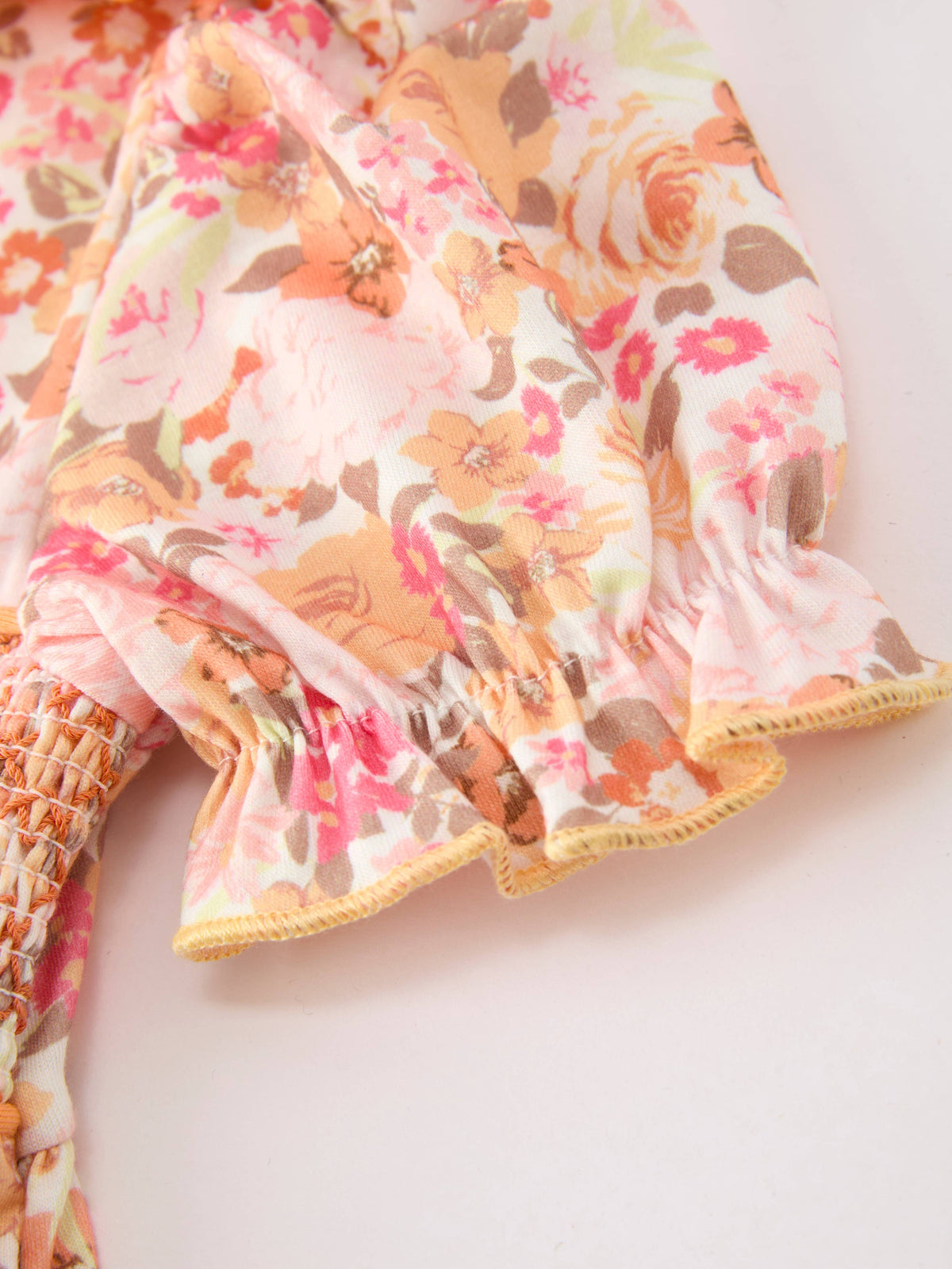Peachy Bow Smocked Floral Dress