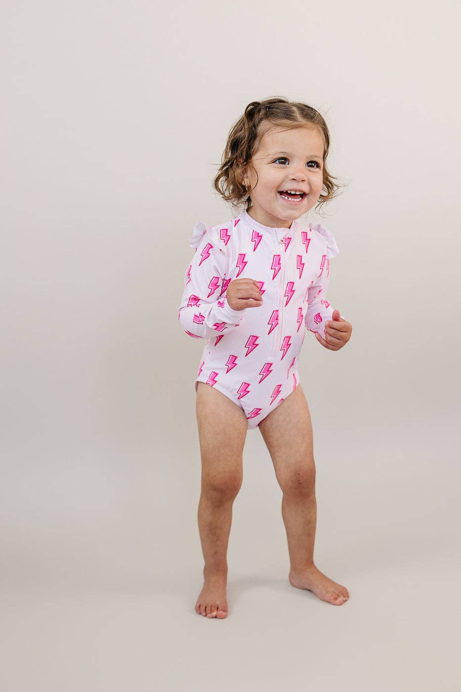 Pink Bolts Long Sleeve Rash Guard Swimmie