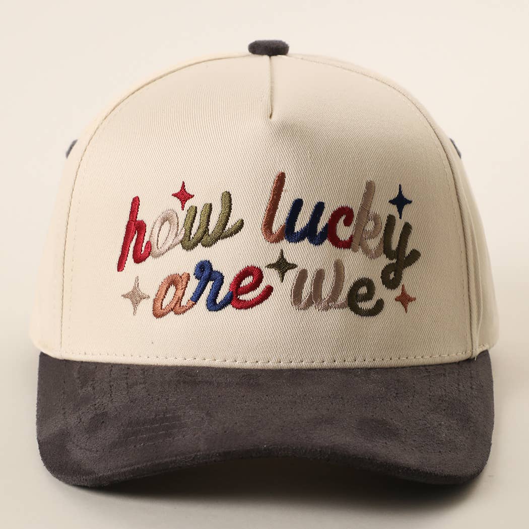 HOW LUCKY ARE WE Embroidered Suede Brim Trucker Hat