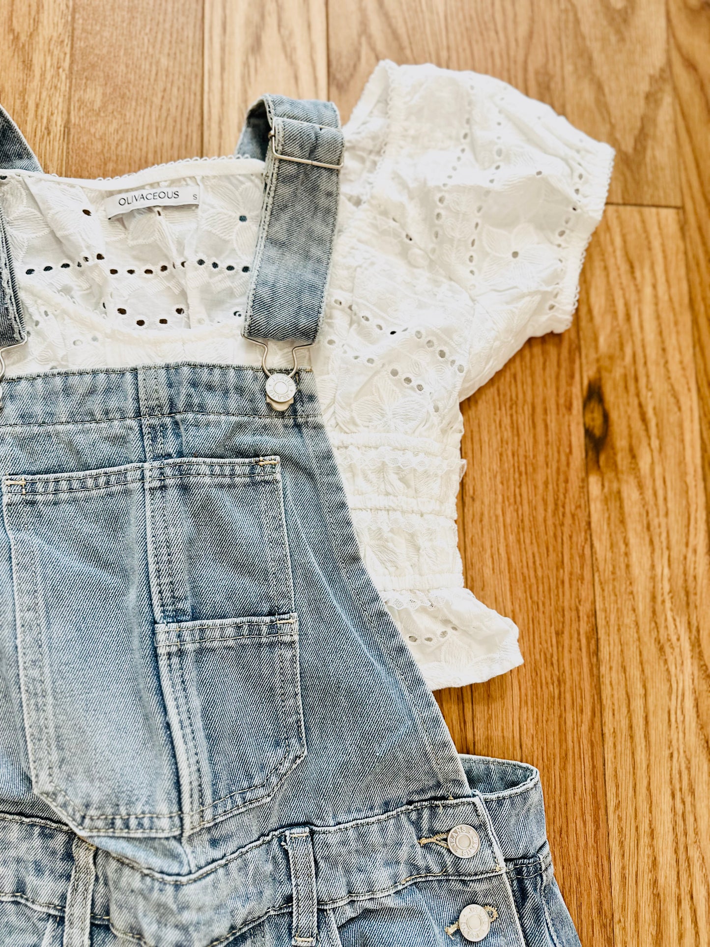 Evelyn Embroidered Eyelet Clasp-Front Peplum