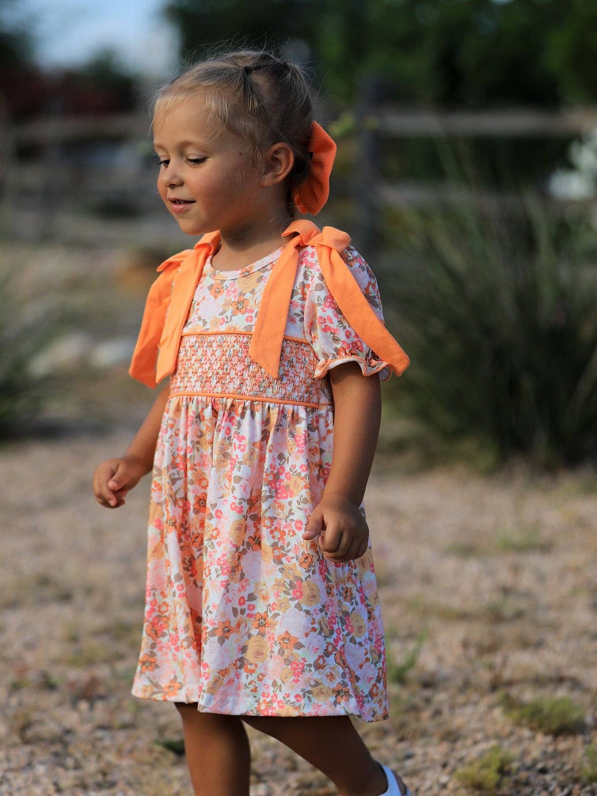 Peachy Bow Smocked Floral Dress