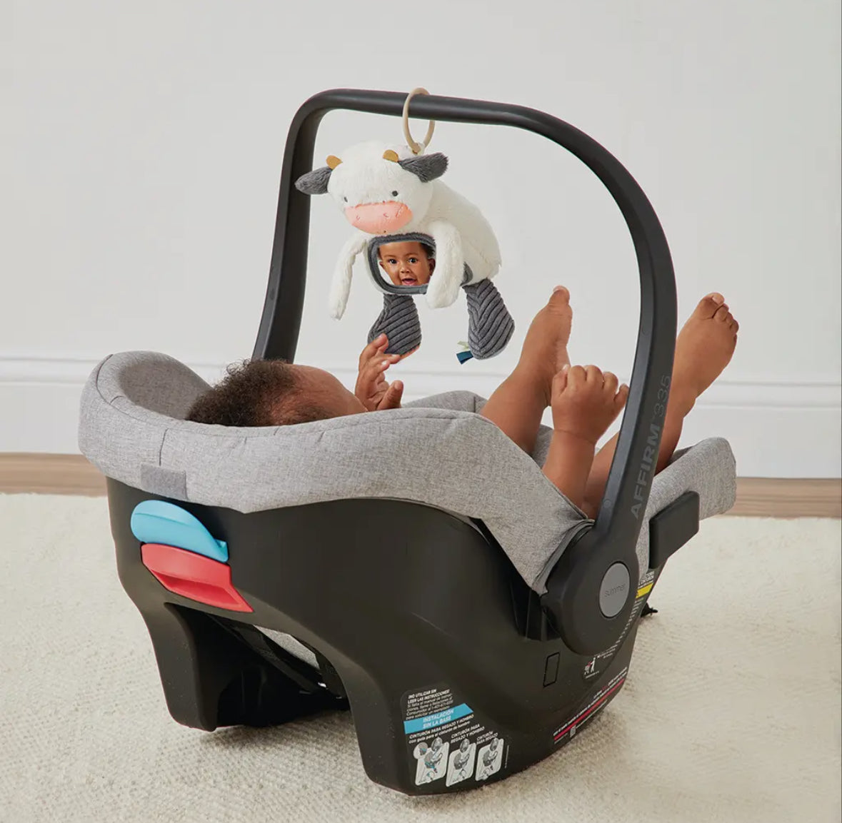 Carmen the Cow - Itzy Bitzy Mirror™ Travel + Tummy Time Toy