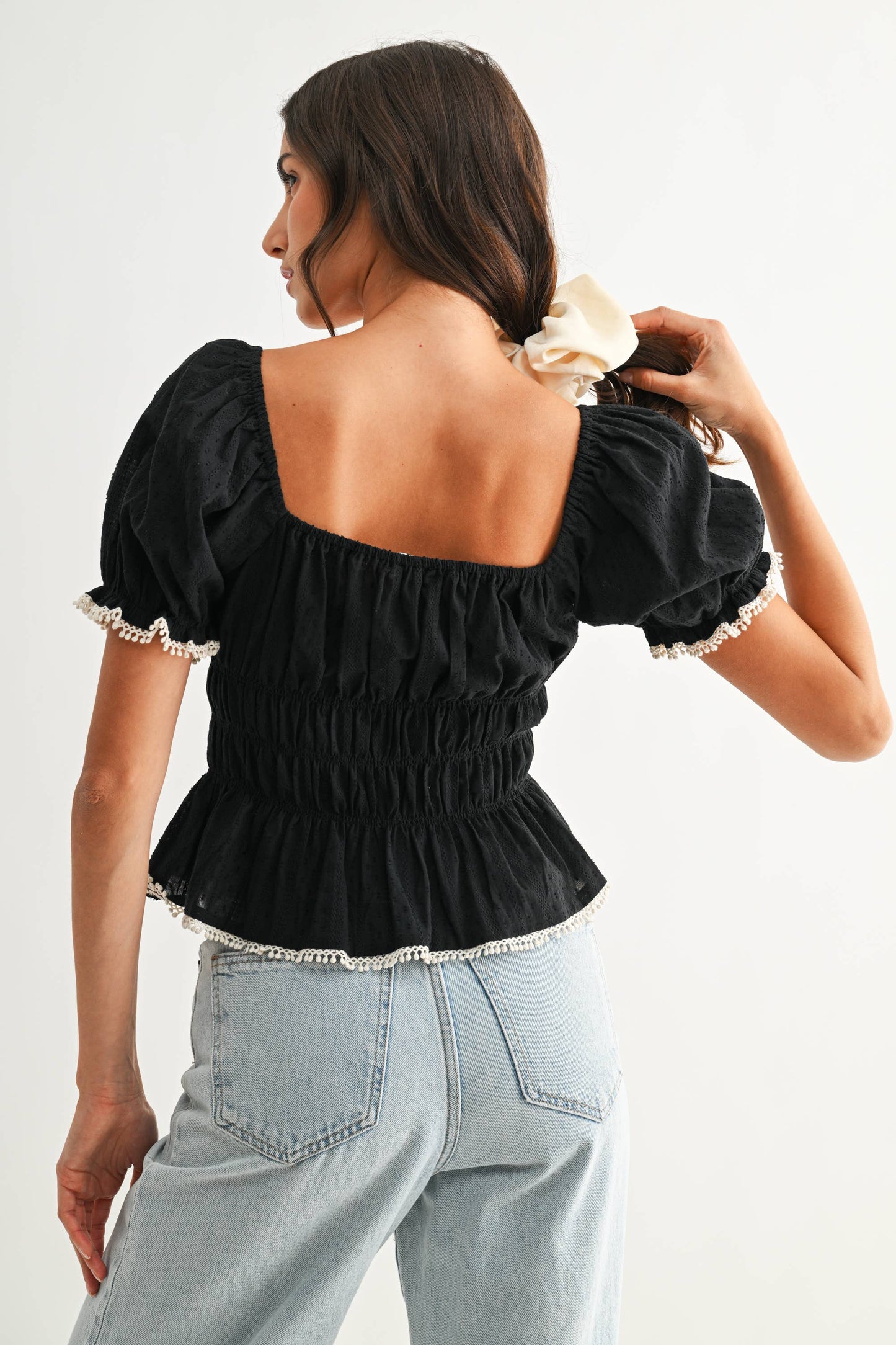 Sophisticated Smocked Peplum with Puff Sleeves