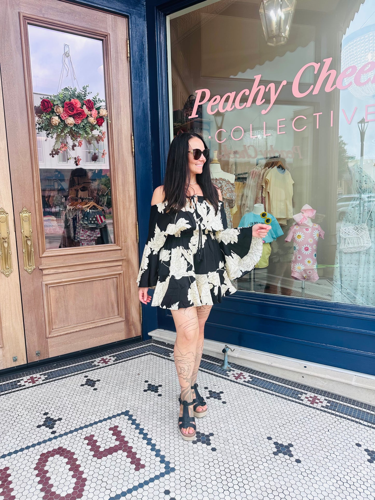 Black Beachy Floral Off The Shoulder Bell Sleeve Romper