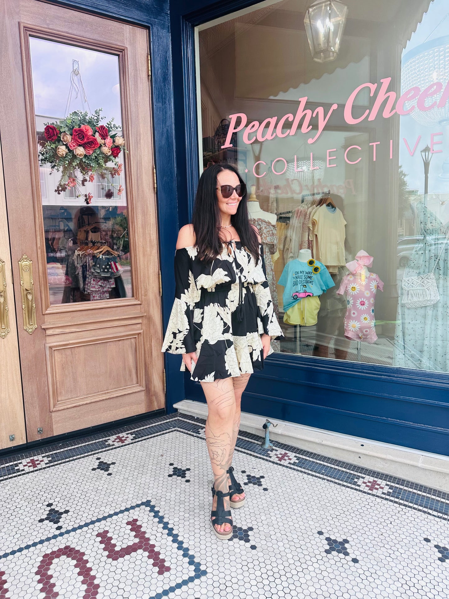 Black Beachy Floral Off The Shoulder Bell Sleeve Romper