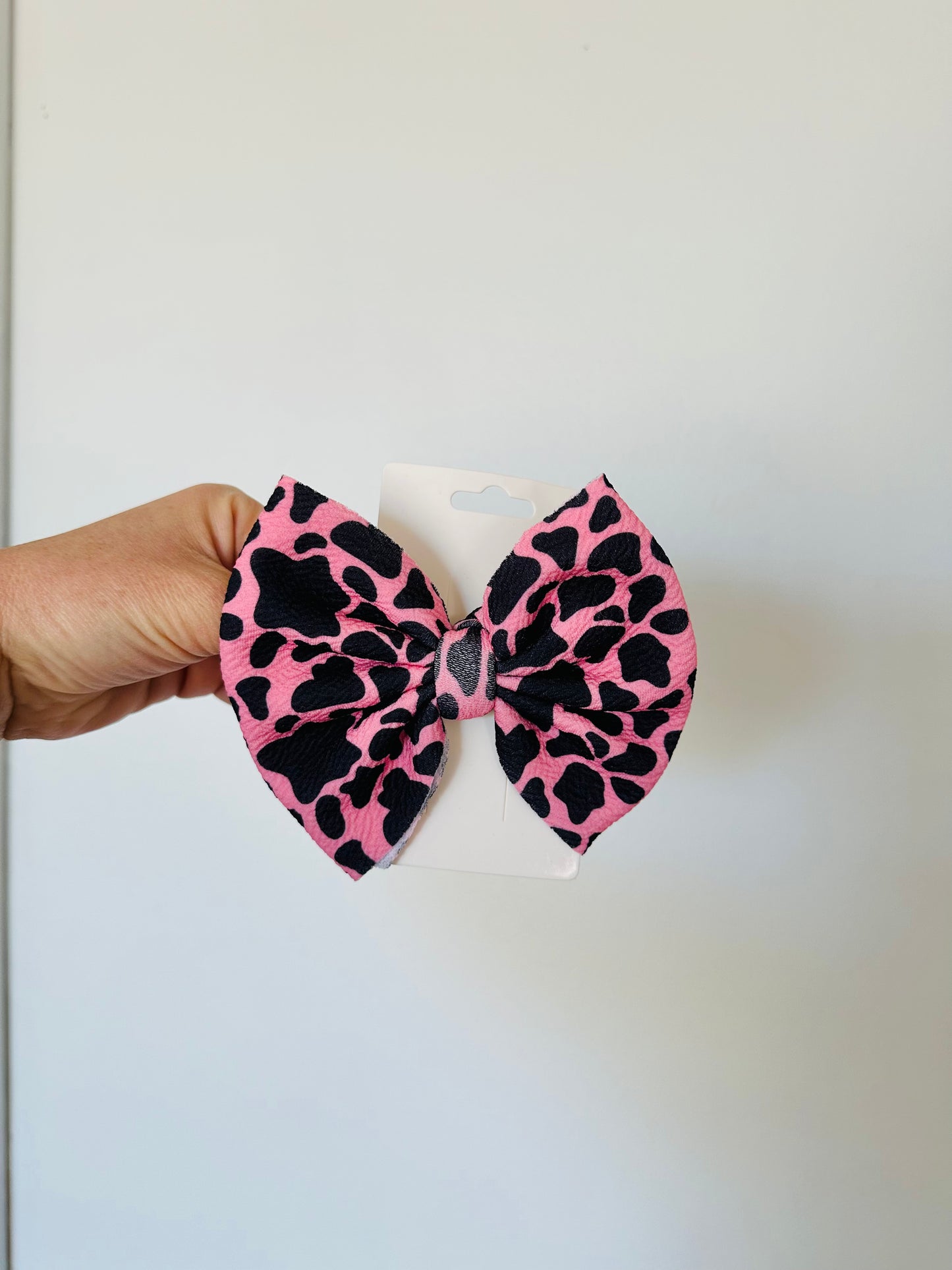 Pink Cowprint Bow on Alligator Clip RTS
