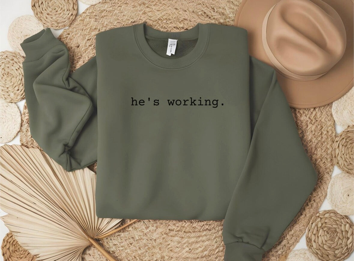He’s Working. Comfort Color Tee