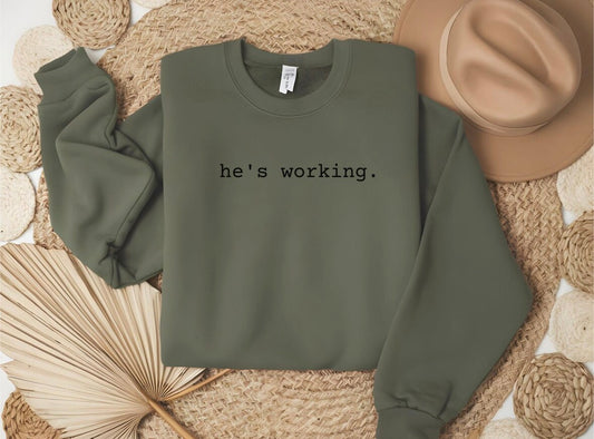 He’s Working. Comfort Color Tee