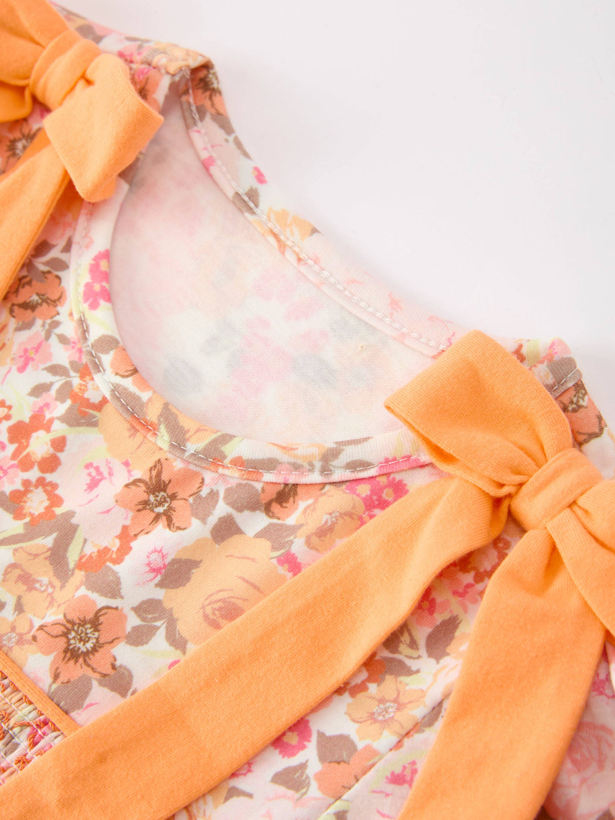 Peachy Bow Smocked Floral Dress